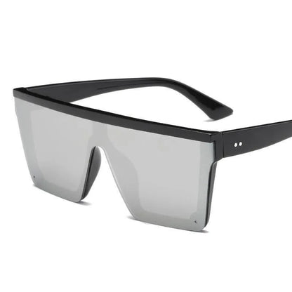 Oversized square fashion sunglasses with black frame and reflective gray lenses
