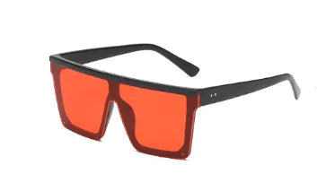 Oversized square sunglasses with black frame and bright red tinted lenses on white background