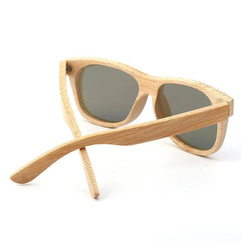 Eco-friendly bamboo frame sunglasses with polarized dark lenses on white background