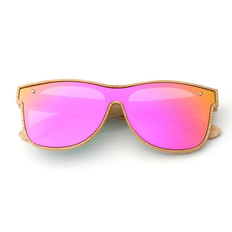 Polarized sunglasses with blue bamboo frame and vibrant pink-orange mirrored lenses on white background