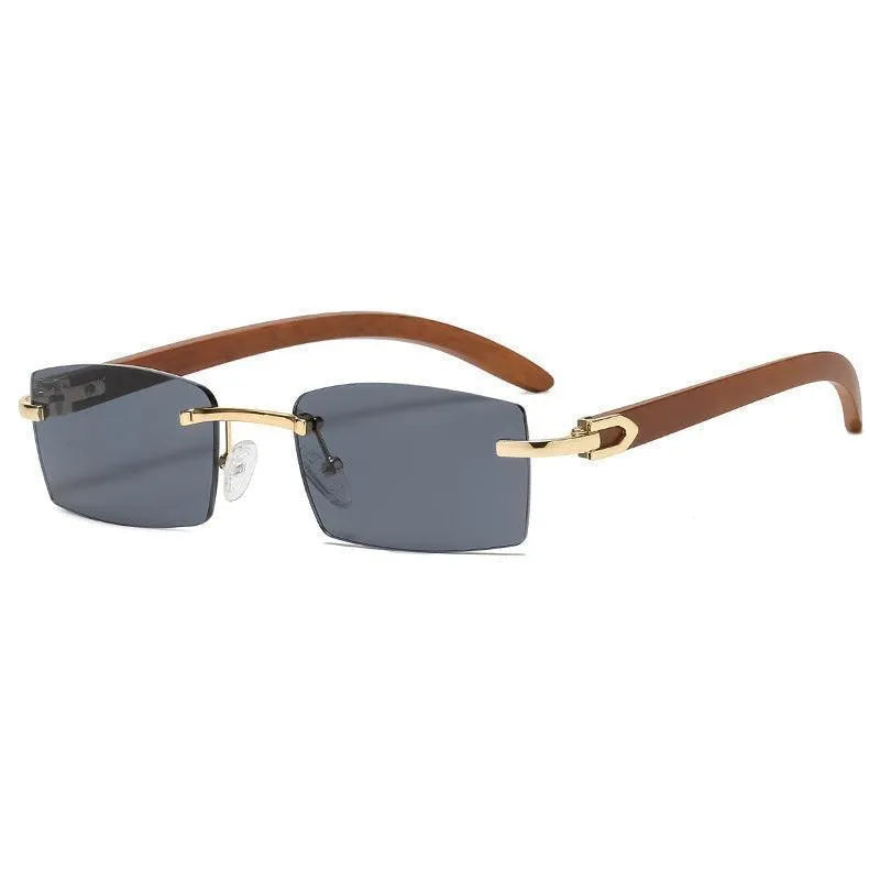 Rimless grey men's sunglasses with gold bridge and brown arms on white background