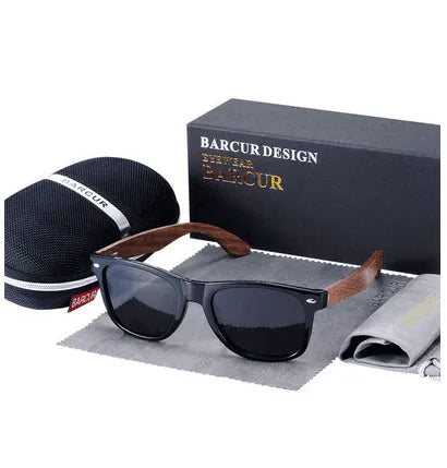 Glossy black sunglasses with wooden arms, polarized lenses, protective case, and cleaning cloth