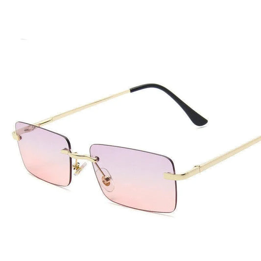 Square rimless sunglasses with pink gradient lenses and gold temples with black ear tips