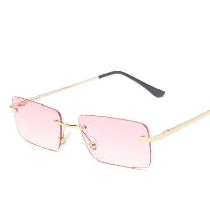 Rimless square sunglasses with pink lenses and gold thin metal temples